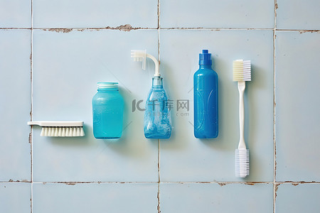 北欧轻奢高级浴室背景图片_瓷砖墙上的四把牙刷和一瓶清洁剂