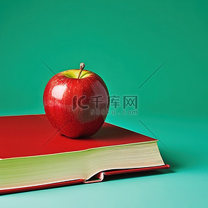 绿色学习学习背景图片_一本打开的书和绿色背景旁边的一个红苹果