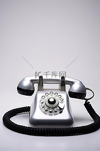双11黑线框背景图片_银色模拟电话，铃上有一根黑线
