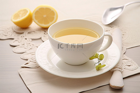 柠檬茶柠檬背景图片_柠檬茶用杯子和勺子