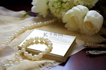 象牙色珍珠婚礼卡和珍珠