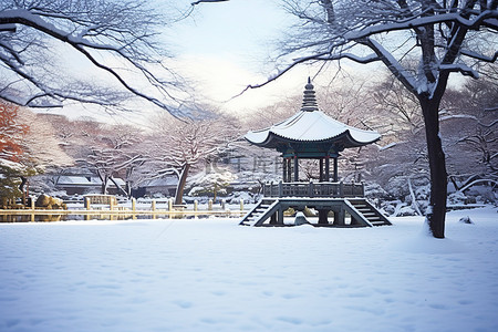 冬天古建筑背景图片_公园在雪中 瑞典馆公园 首尔南部 冬天在公园首尔南部散步