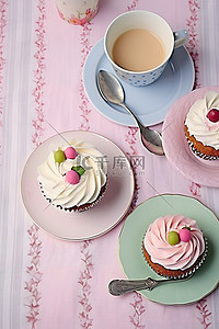 奶茶店招牌背景图片_一杯茶纸杯蛋糕和放在桌布上的盘子