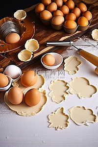 桌子面粉背景图片_鸡蛋和饼干刀都在桌子上