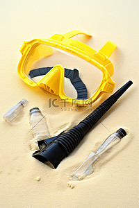通气管背景图片_沙滩上的一套黄色水肺潜水设备，配有通气管和吹嘴