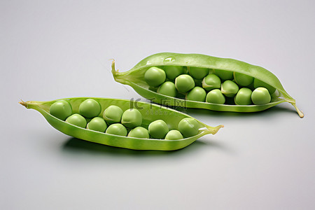 蔬菜种子种子背景图片_豌豆呈 V 形，里面有绿色种子