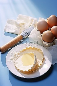 麦多馅饼背景图片_馅饼卷和一些鸡蛋放在两个白盘子和粗棉布上