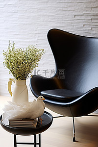蛋椅桌家居设计灵感如何用咖啡桌书和鲜花装饰大型黑蛋椅