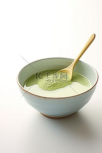 抹茶背景图片_一碗抹茶绿茶，上面有一个勺子