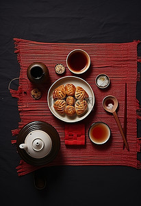 茶背景图片_黑色背景中的crostata茶壶米饭和其他小吃