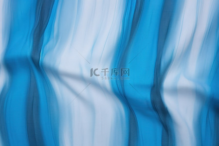 韩国蓝色背景图片_使用扎染制成的蓝色和白色织物