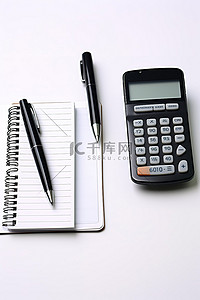 桌上办公用品背景图片_电话笔和计算器设置在白桌上