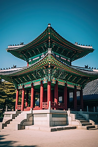 藏红背景图片_一座红绿相间的宝塔，有白色的柱子和绿色的屋顶