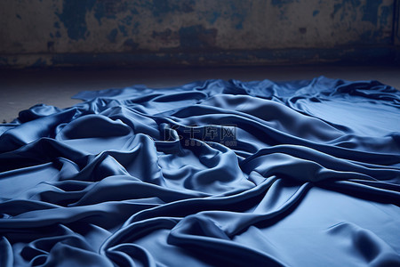 窗帘布背景图片_缎面深蓝色窗帘布