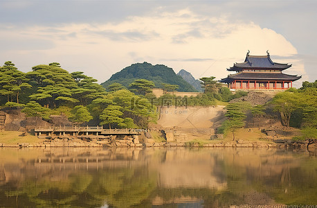 湖上游船卡通背景图片_河上的景色，上面有一座寺庙