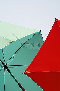 中医手把药背景图片_两把彩色雨伞，一只手拿着风