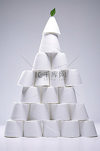 环保循环使用背景图片_金字塔是由成堆的纸巾组成的