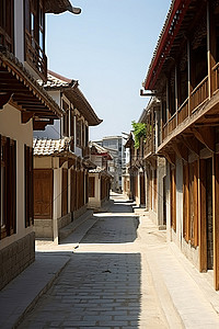 日本建筑背景图片_一条狭窄的街道，两旁排列着许多古老的建筑