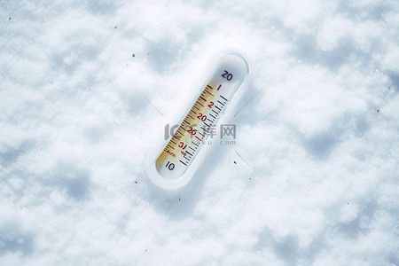 天气温度计背景图片_将温度计放在一些雪上