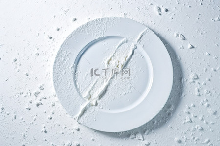 儿童餐盘画背景图片_餐盘被制成雪雕的照片