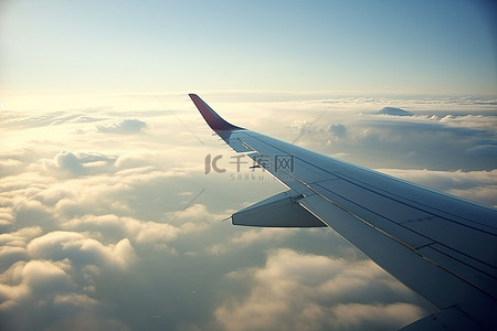 飞机空中背景图片_从空中看飞机的机翼