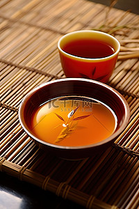 栀子花茶背景图片_竹子上盛着茶的碗