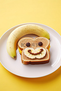 糖果可爱背景背景图片_盘子里有香蕉和香蕉面包的表情符号三明治