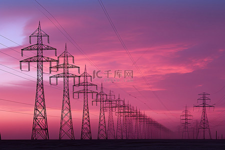 夕阳下，粉红色背景下，几座电力塔的轮廓映衬而出