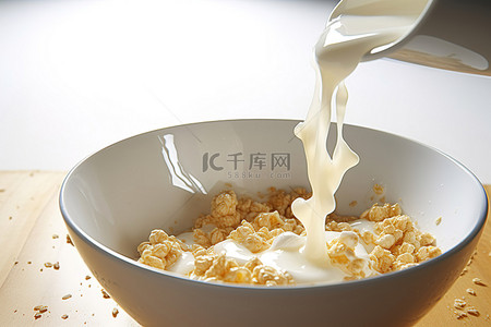 燕麦牛奶背景图片_一碗玉米糖浆牛奶和燕麦