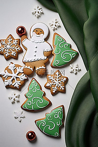 雪花粒子背景图片_圣诞袜上放着几块圣诞饼干和装饰品