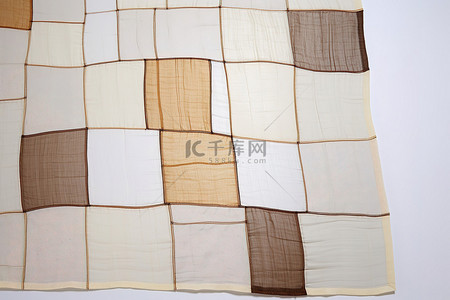 韩国传统图案背景图片_“奇怪的织物”上有棕褐色和棕色的图案