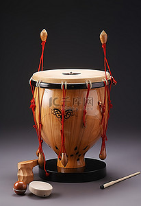 傳統樂器背景图片_一个木鼓和一组棍子