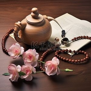木制茶壶背景图片_木制茶壶 念珠 玫瑰 笔和纸