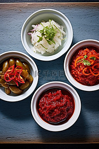 鱼露背景图片_白碗里的酸辣酱腌菜和泡菜