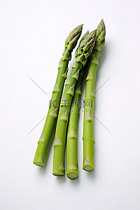 蔬菜免扣PNG图背景图片_白色背景前的两根绿芦笋