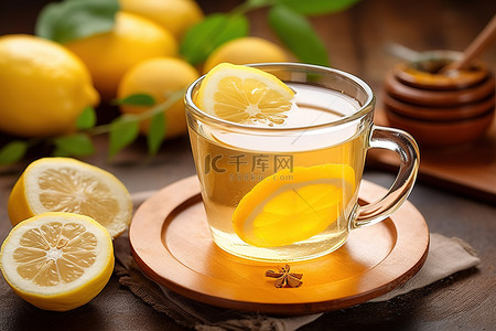 四季背景图片_一杯加柠檬片和蜂蜜的茶