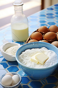 烤饼背景图片_烤鸡蛋黄油和面粉放在桌面上