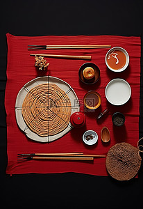 米饭筷子背景图片_黑色背景中的crostata茶壶米饭和其他小吃
