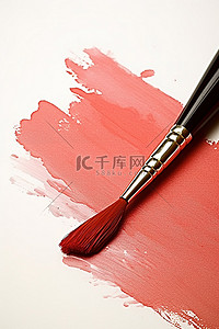 抓东西的手背景图片_画笔用于将某些东西涂成红色