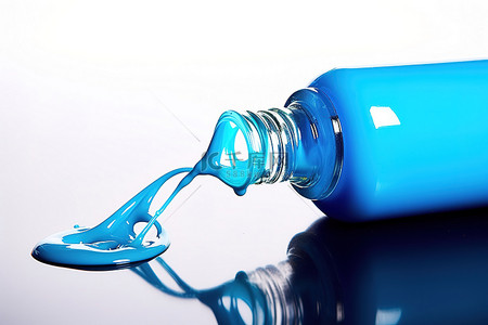 美甲美睫字体背景图片_白色表面上的一个蓝色小抛光瓶
