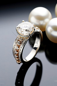 钻石结婚戒指置于珍珠之上