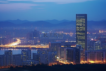 高楼林立背景图片_黄昏时分的首尔城市，高楼林立
