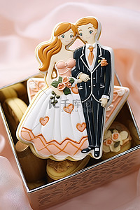情侣婚礼背景图片_幸福的小情侣婚礼饼干