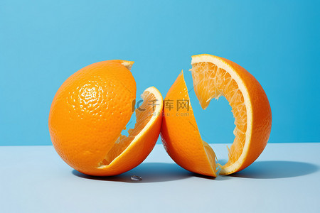 切橙子背景图片_两个切成两半的橙子