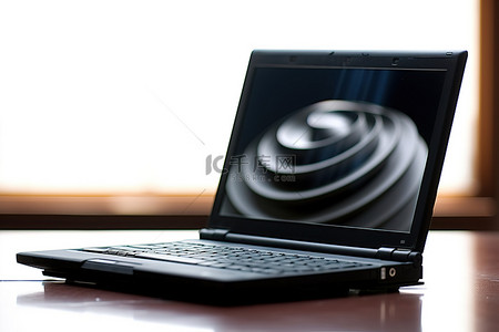 科技互联网背景图片_办公桌上的黑色笔记本电脑