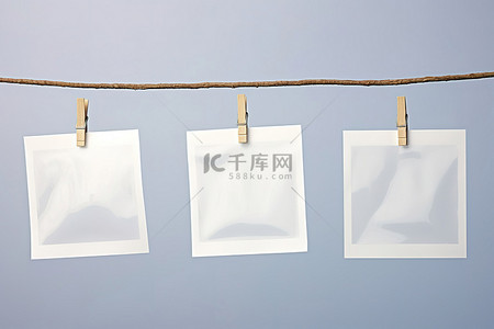 蒸饺包装背景图片_晾衣绳上的白色空包装照片蒙得维的亚
