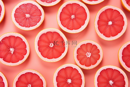 水果柚子背景图片_柚子片被制成亮粉色背景的图案
