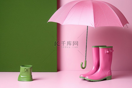 一把粉色雨伞粉色雨鞋和绿色墙上的粉色雨伞