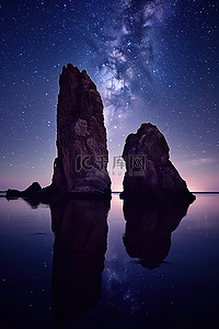 星星夜空背景图片_水中倒映着两块岩石