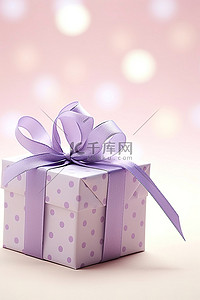 粉色礼品盒背景图片_带紫色圆点丝带和生日快乐信息的礼品盒